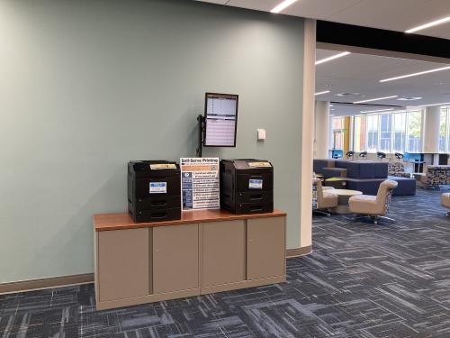 cabinet with two printers and display monitor in MU first floor lounge