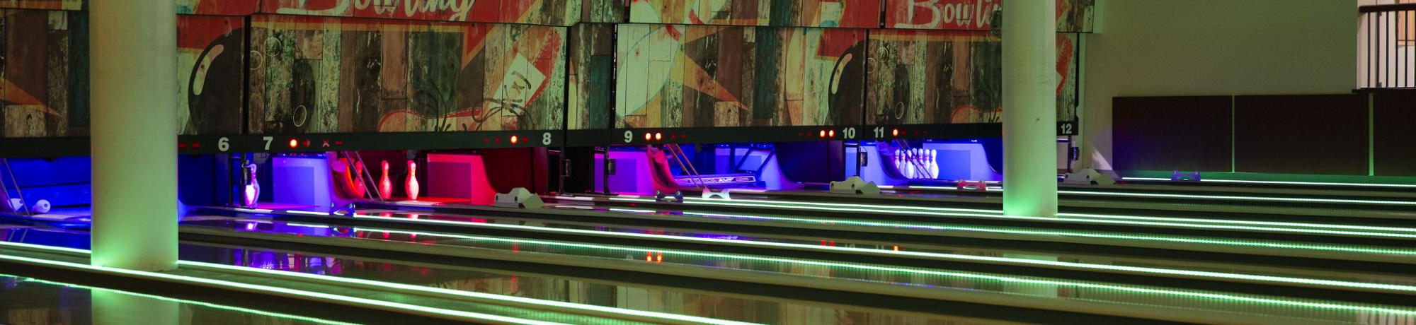the games area bowling alley lanes with colorful led lights